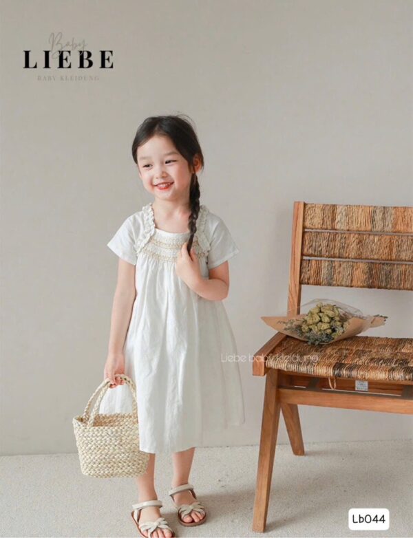 Đầm trắng smock bé gái 12-40kg