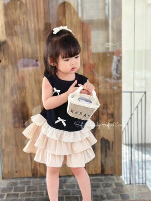 Set nơ áo đen cân vây tầng kem