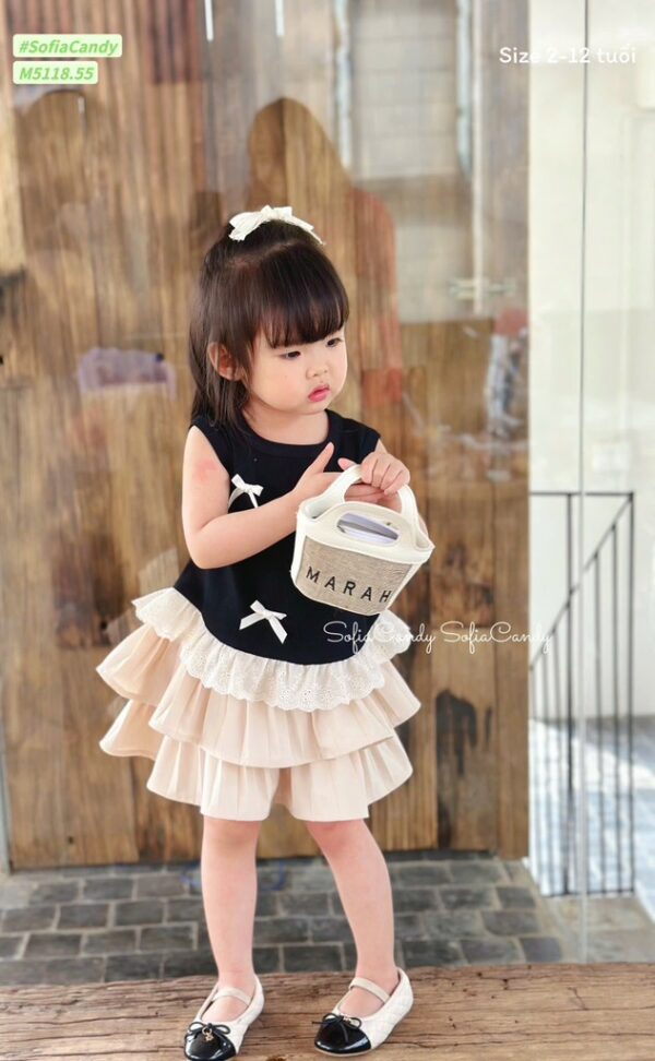 Set nơ áo đen cân vây tầng kem